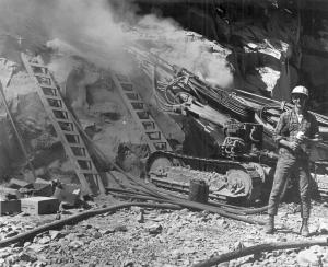 Drilling holes for dynamite